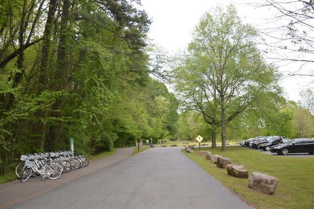 4244 River Green Dr NW Unit 111, Atlanta, GA 30327 - view of road featuring traffic signs