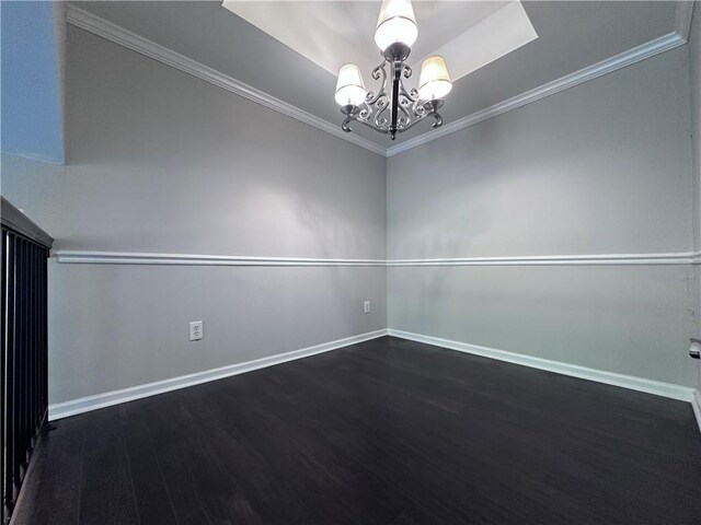 4244 River Green Dr NW Unit 111, Atlanta, GA 30327 - unfurnished room featuring baseboards, a chandelier, ornamental molding, and wood finished floors