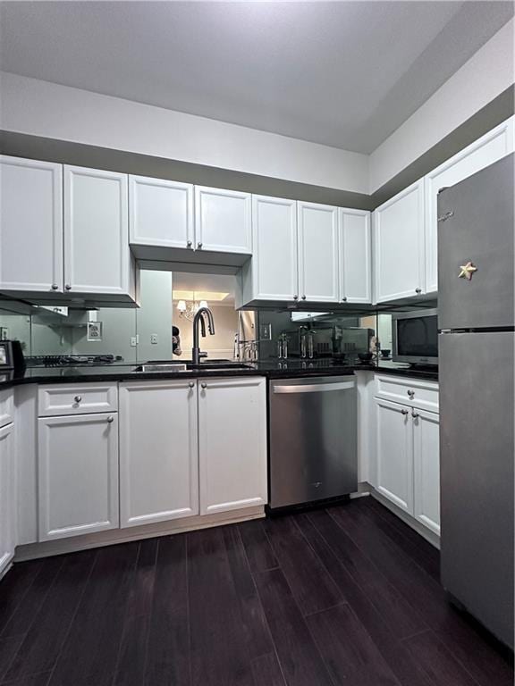 kitchen featuring white cabinetry, appliances with stainless steel finishes, and sink