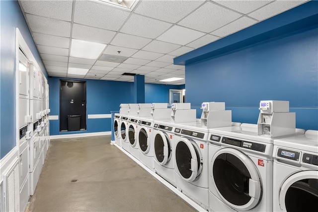 laundry area with washer and dryer and stacked washer and clothes dryer