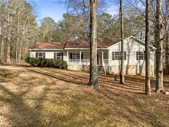 ranch-style home featuring crawl space and covered porch