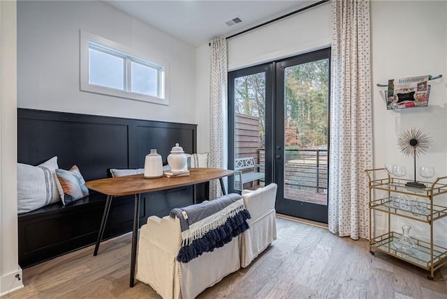 interior space with light hardwood / wood-style floors and access to outside