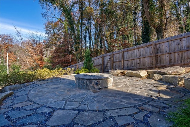 view of patio featuring a fire pit