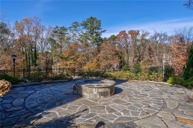 view of patio featuring a fire pit