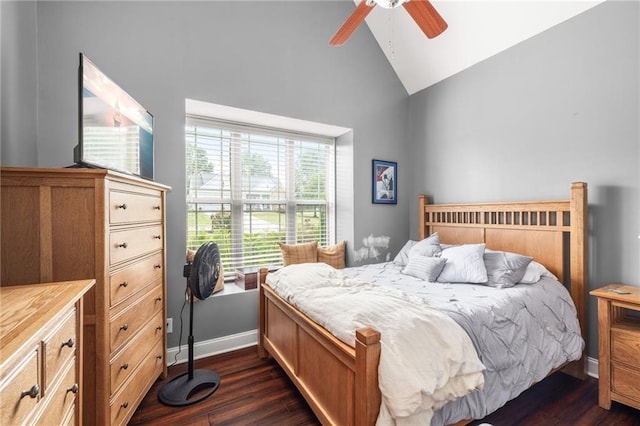 bedroom with lofted ceiling, dark wood-type flooring, and ceiling fan