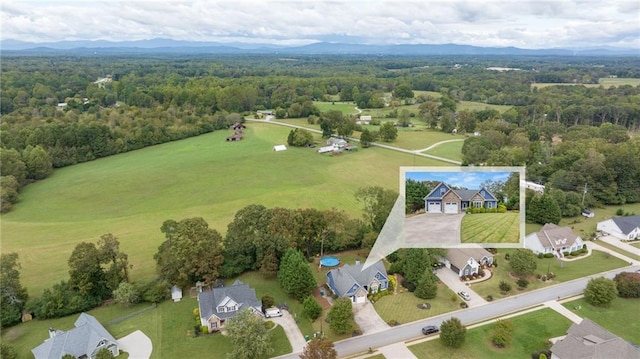 drone / aerial view featuring a mountain view