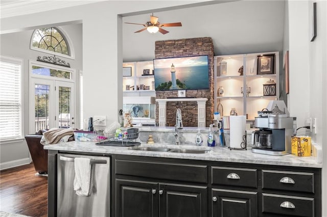 bar featuring a healthy amount of sunlight, sink, stainless steel dishwasher, and dark hardwood / wood-style floors