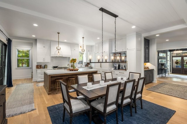 dining space featuring light hardwood / wood-style floors