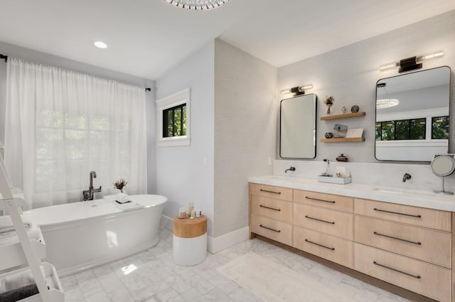 bathroom featuring a bathtub and vanity