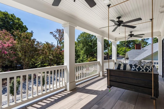 deck featuring ceiling fan and covered porch