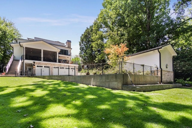 view of yard with a sunroom