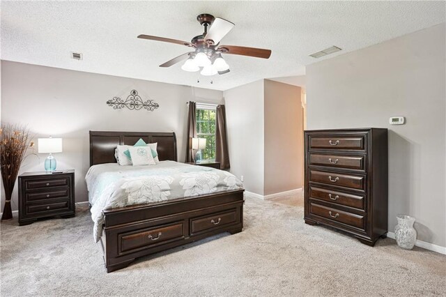 285 Aspen Way, Fayetteville, GA 30214 - bedroom with light carpet, a textured ceiling, and baseboards
