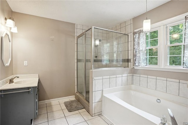 285 Aspen Way, Fayetteville, GA 30214 - full bath with a bath, vanity, a shower stall, tile patterned flooring, and baseboards