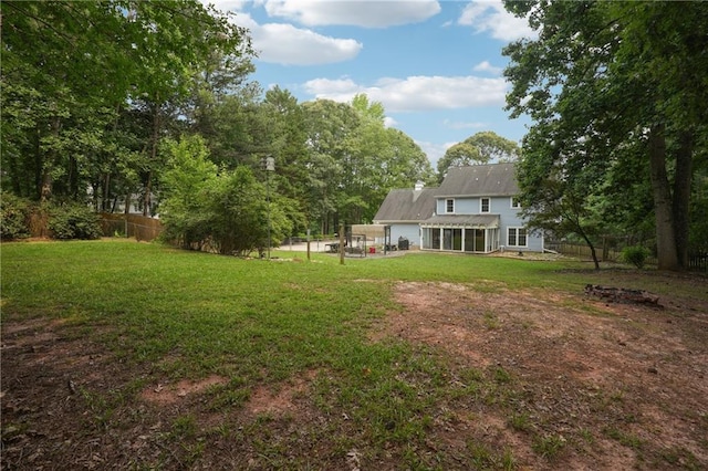 285 Aspen Way, Fayetteville, GA 30214 - view of yard featuring a sunroom