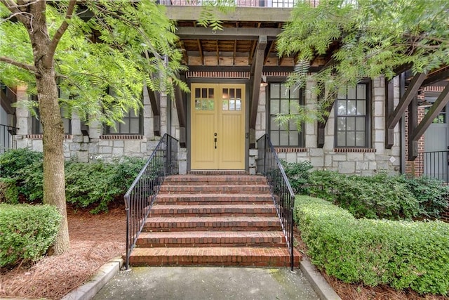 345 Glen Iris Dr NE Unit 3, Atlanta, GA 30312 - doorway to property with stone siding