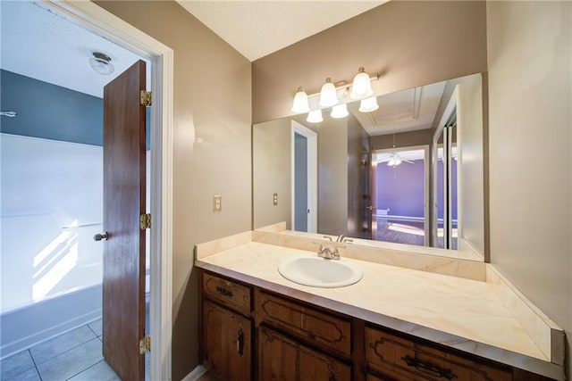 bathroom with tile patterned floors and vanity