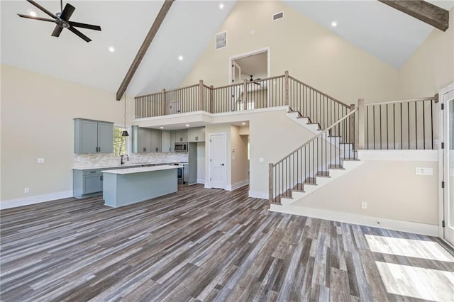 275 River Cliff Dr, Cornelia, GA 30531 - kitchen with a kitchen bar, light countertops, and a kitchen island
