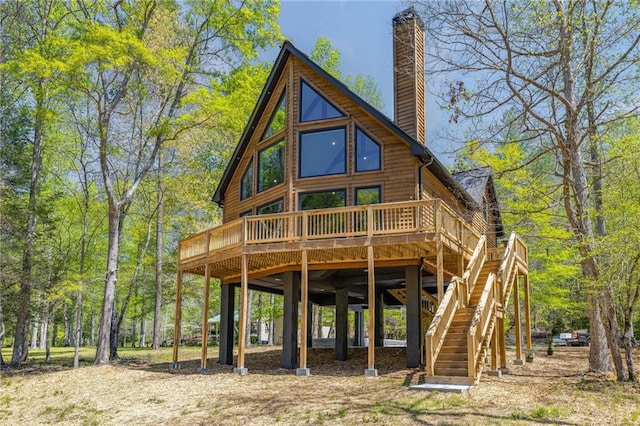 275 River Cliff Dr, Cornelia, GA 30531 - rear view of property featuring a chimney and a wooden deck