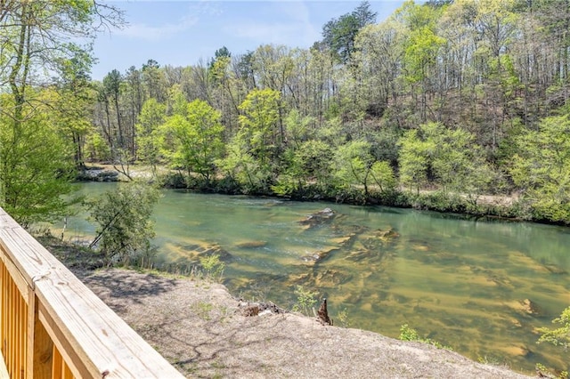275 River Cliff Dr, Cornelia, GA 30531 - view of front of property with a chimney, stairway, a carport, and metal roof