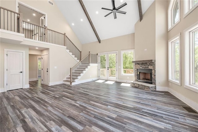 275 River Cliff Dr, Cornelia, GA 30531 - interior space featuring high vaulted ceiling, stairs, french doors, a fireplace, and beam ceiling