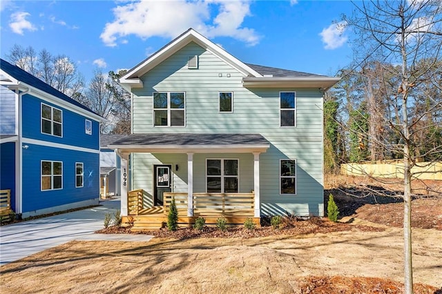 view of front property featuring covered porch