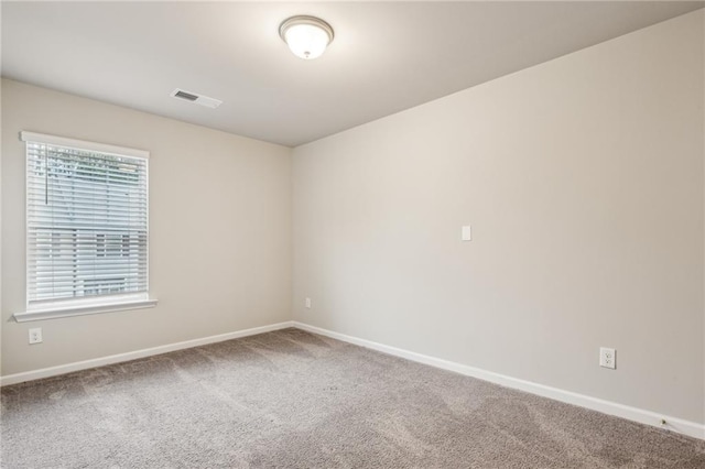 view of carpeted spare room