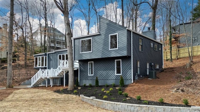 view of side of property with a sunroom