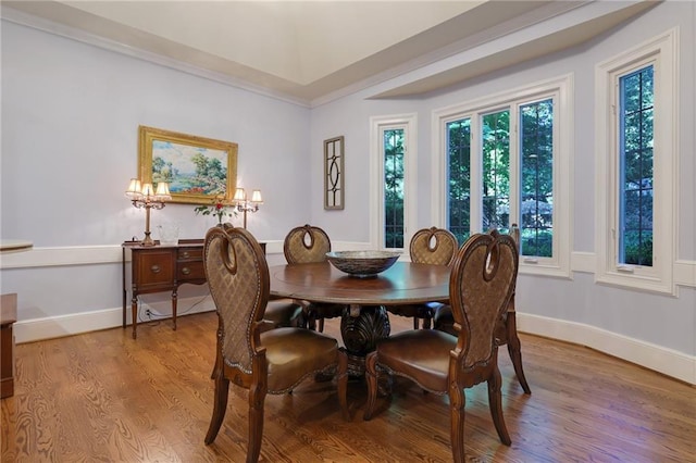 dining space with an inviting chandelier and light wood-type flooring