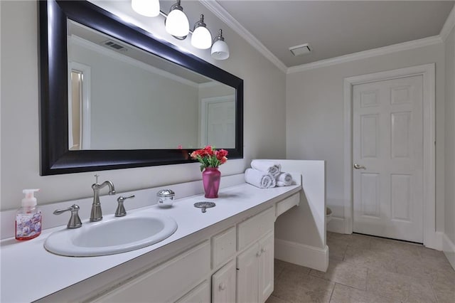 bathroom featuring tile flooring, ornamental molding, and vanity with extensive cabinet space