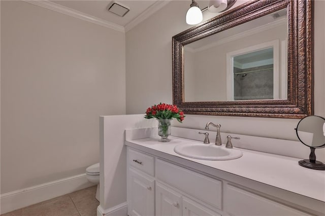 bathroom with toilet, crown molding, large vanity, and tile flooring