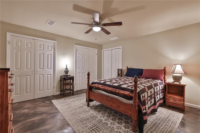 bedroom featuring multiple closets and ceiling fan