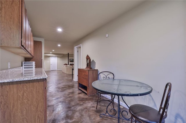 kitchen featuring light stone countertops