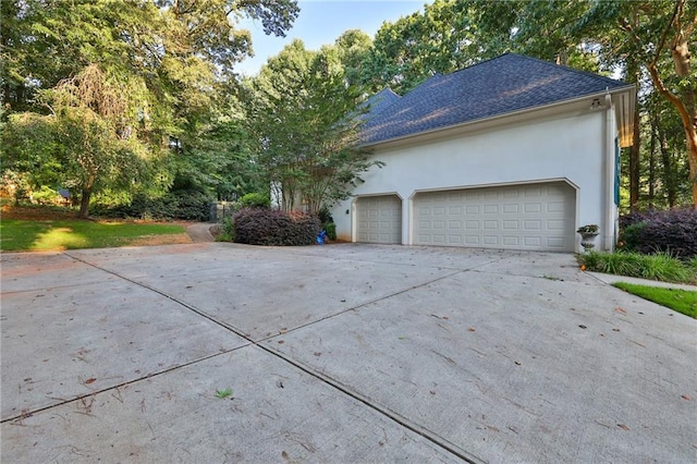 view of property exterior featuring a garage