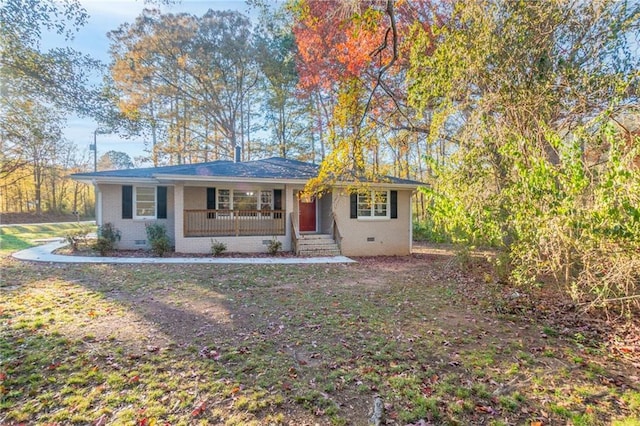 single story home featuring covered porch