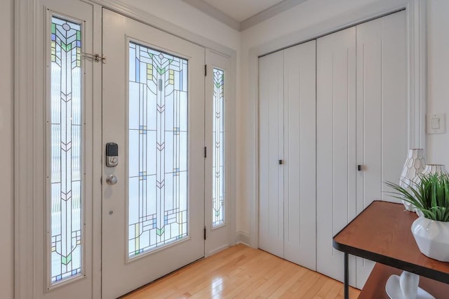 doorway to outside with light hardwood / wood-style flooring