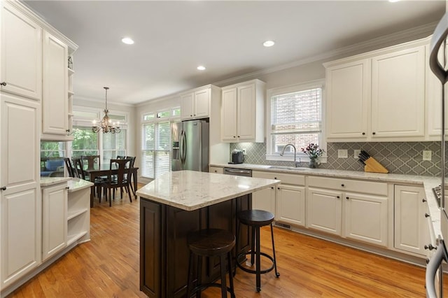 4404 Old Georgetown Trl, Atlanta, GA 30338 - kitchen with stainless steel fridge with ice dispenser, open shelves, a sink, white cabinetry, and ornamental molding