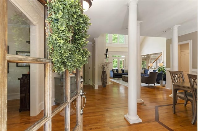 4404 Old Georgetown Trl, Atlanta, GA 30338 - doorway featuring decorative columns, wood finished floors, baseboards, and ornamental molding