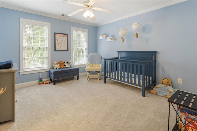 4404 Old Georgetown Trl, Atlanta, GA 30338 - carpeted bedroom featuring multiple windows, ornamental molding, a nursery area, baseboards, and ceiling fan