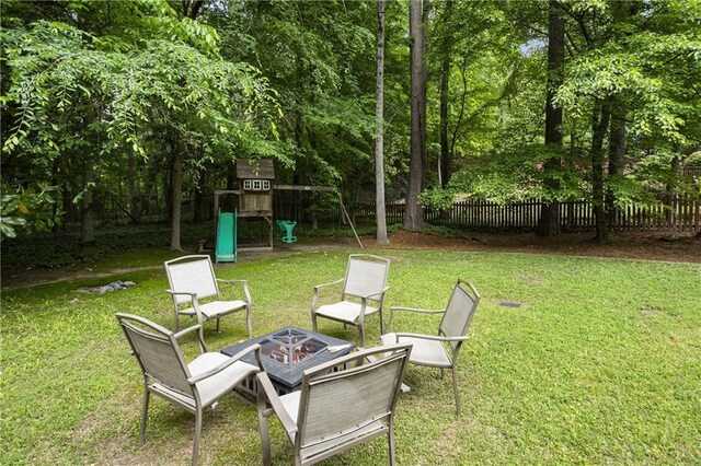 4404 Old Georgetown Trl, Atlanta, GA 30338 - view of yard featuring a playground and an outdoor fire pit