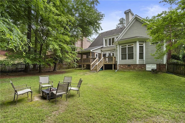 4404 Old Georgetown Trl, Atlanta, GA 30338 - back of property with a sunroom, a chimney, stairway, crawl space, and a fire pit