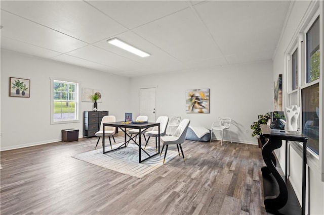 4781 Brownsville Rd, Powder Springs, GA 30127 - dining area with wood finished floors, baseboards, and a desk
