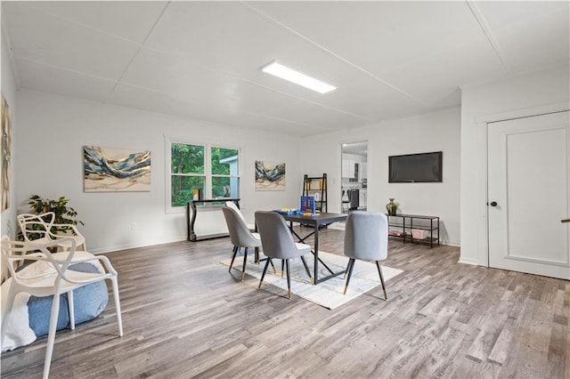 4781 Brownsville Rd, Powder Springs, GA 30127 - dining room featuring light wood-style flooring and baseboards