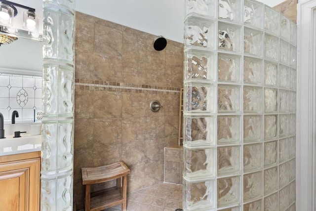 bathroom featuring vanity and walk in shower