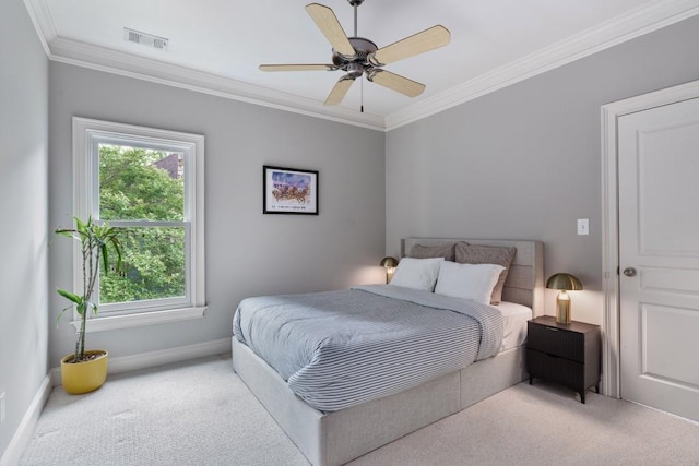 bedroom with carpet flooring, baseboards, and ornamental molding