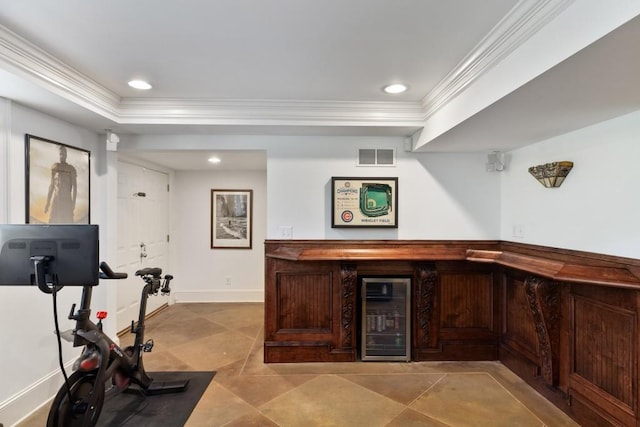 bar with visible vents, ornamental molding, wine cooler, recessed lighting, and a raised ceiling