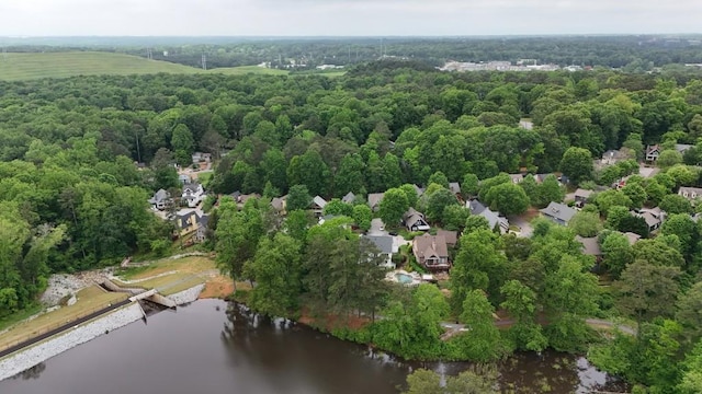 birds eye view of property with a residential view and a water view