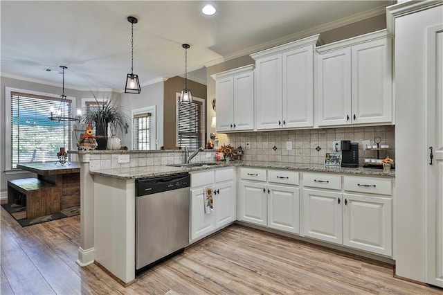 kitchen featuring white cabinets, kitchen peninsula, light hardwood / wood-style flooring, and stainless steel dishwasher