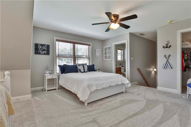 bedroom featuring ceiling fan and light colored carpet