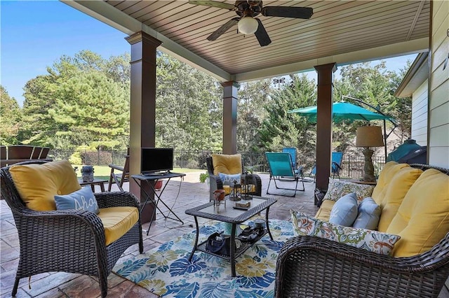 view of patio featuring outdoor lounge area and ceiling fan