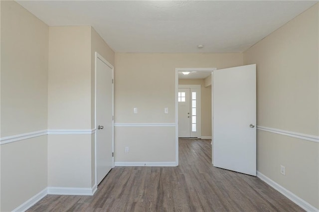 unfurnished room featuring light hardwood / wood-style flooring